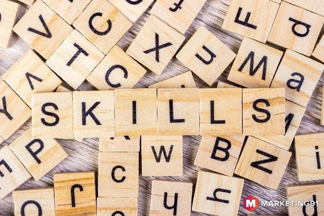 Skills Word Written In Wooden Cube. Wooden Cube Background